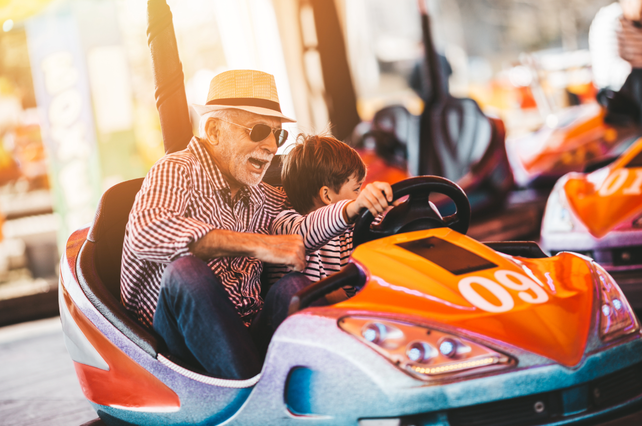  Picture of grandpa on a go cart with their grand kid